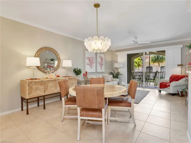 Dining Area & Living Room with Crown Molding & Ceiling Fan & Sliders with Plantation Shutters