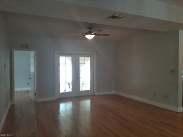 large living room with entry to patio area
