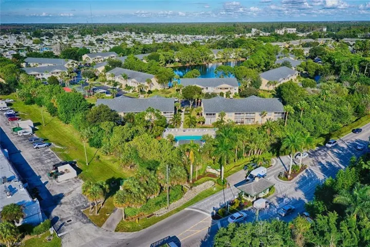 Aerial view of residential area with a tree filled landscape