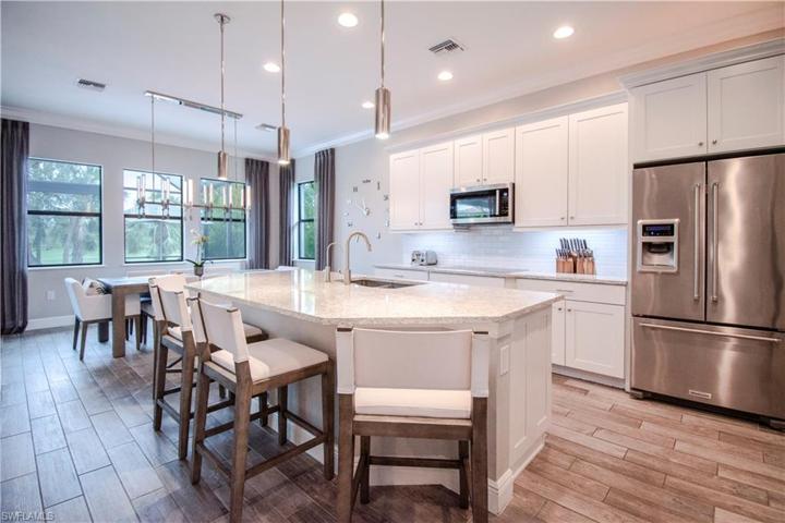 Gourmet Kitchen with double ovens and KitchenAid Stainless Applicances