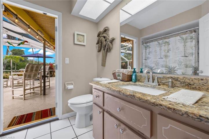 Full pool/guest bath is accessible from lanai.