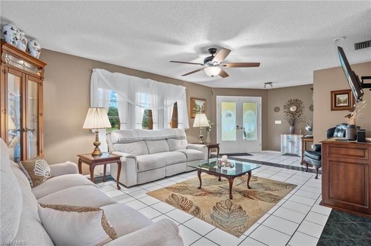 Large living room with lots of natural light