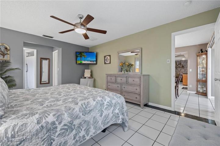 Primary bedroom is tile as is the rest of the home