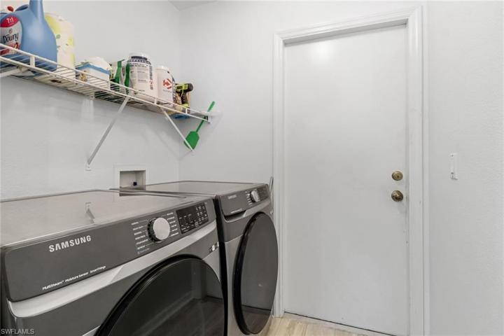laundry room w front load washer/dryer