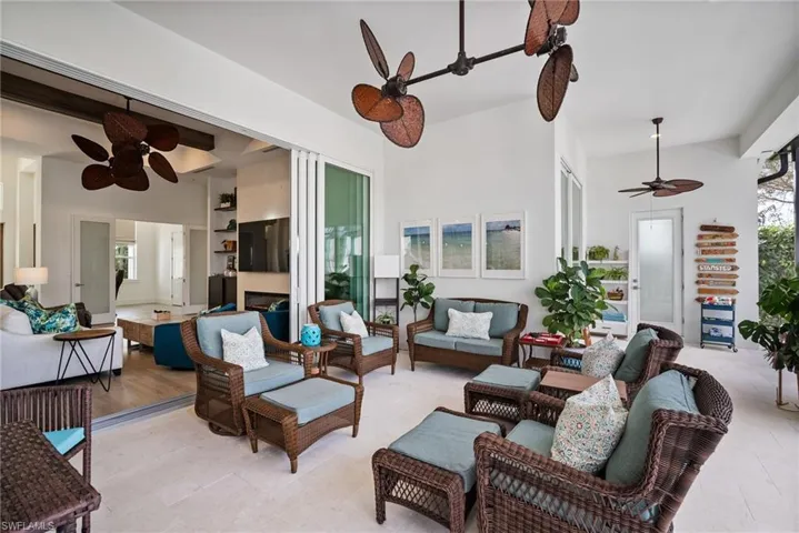 Living room featuring ceiling fan