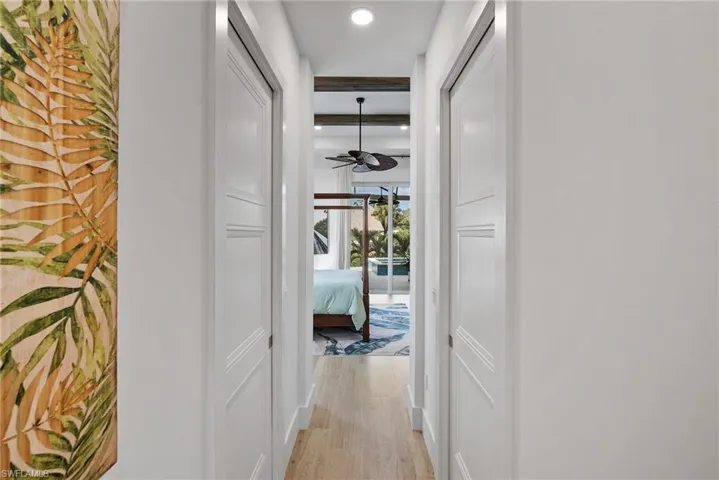 Hallway featuring light hardwood / wood-style floors