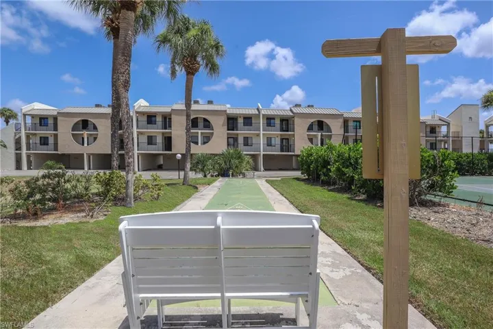 View of home's community with shuffleboard