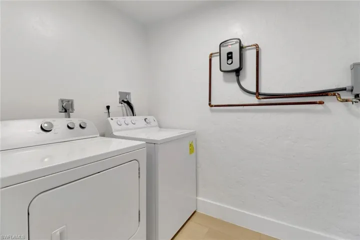 Individual laundry rooms and tankless water heaters