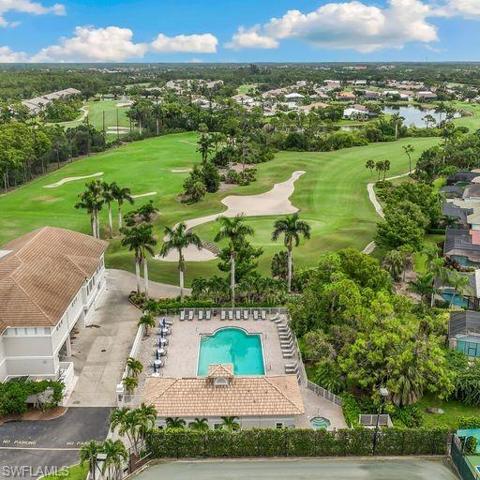 Club pool with practice range on left side #18 on right side of photo