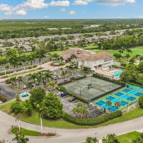 Pickleball and tennis near Club and pool