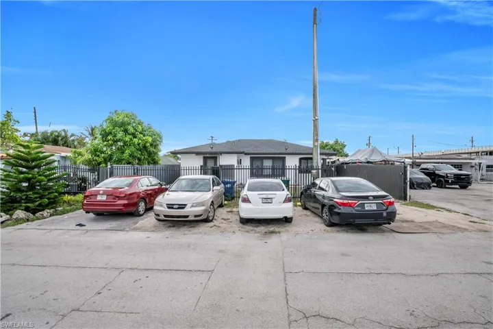 Paved parking area offering multiple spaces