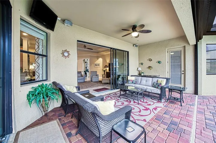 View of patio / terrace featuring ceiling fan and an outdoor hangout area