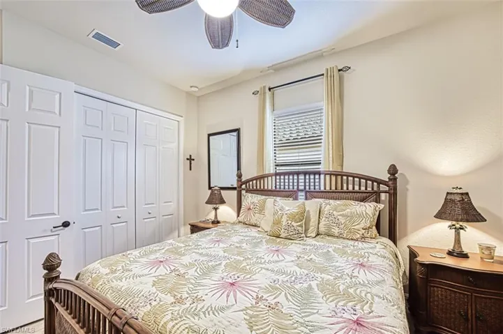Bedroom with a closet, and ceiling fan