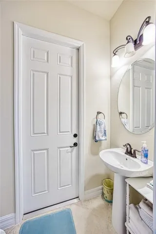Bathroom with tile patterned flooring