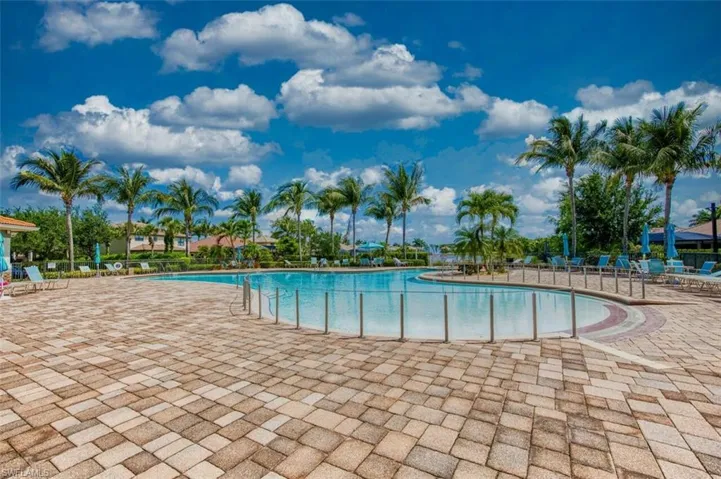 Community Pool featuring a patio area & must see complex amenities