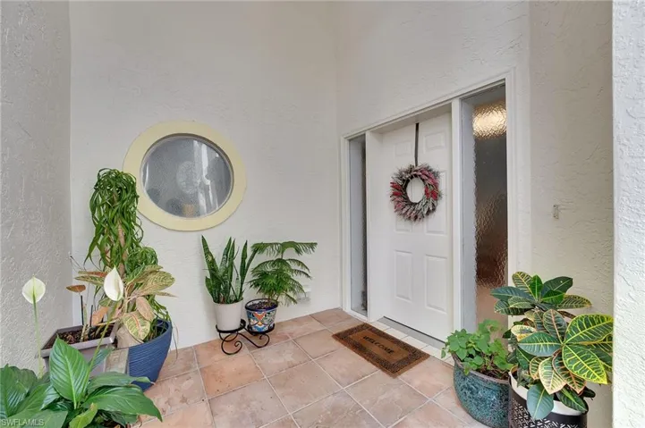 Your front entry is beautifully enhanced with sidelights that invite in abundant natural light, complemented by a tiled entrance that creates a refined and welcoming first impression.