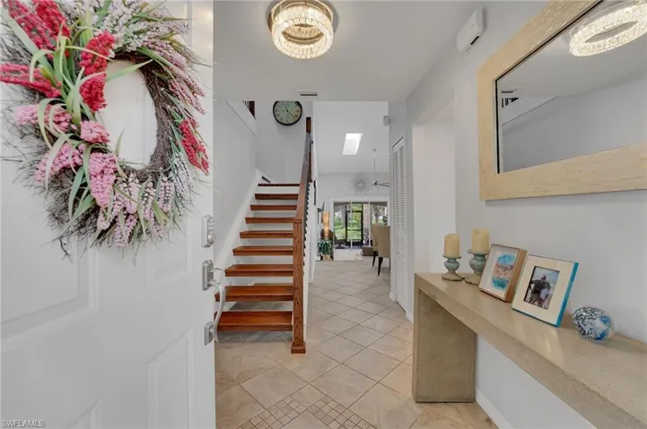 As this stunning staircase carries you to the second level, you are welcomed into two additional oversized bedrooms and a beautifully appointed full bath, offering comfort, space, and refined functionality for family and guests alike.