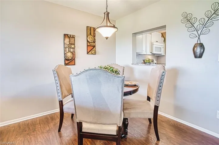 Dining room with wood finished floors