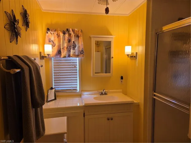 Hall Bath with walk-in shower.