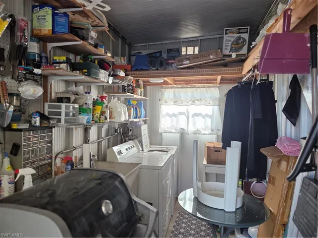 Lots of storage space in the shed, along with the washer, dryer, and laundry tub.