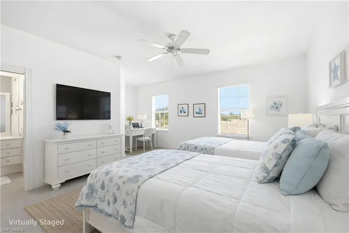 Virtually Staged extra large second floor Bedroom with TWO Queen Beds and desk