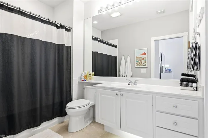 Second Floor full bath with vanity, shower / bath combo