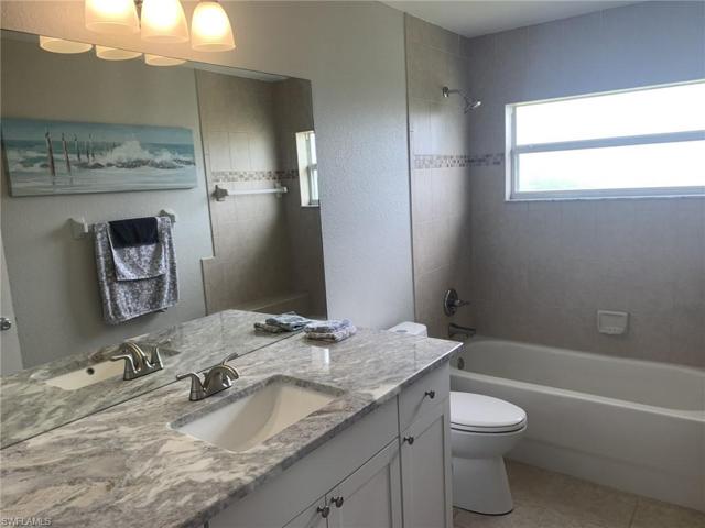 The guest bath is gorgeous, with new vanity, new granite counters, new lighting and plumbing fixtures.  The home shines!