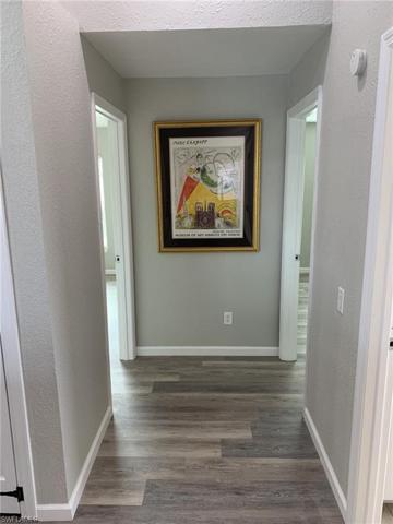 Hallway leading to the guest bedrooms, they are on a separate side of the home from the owners suite.