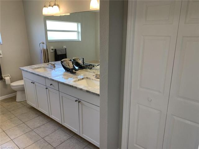 Double sinks in the master bath and a huge linen closet.