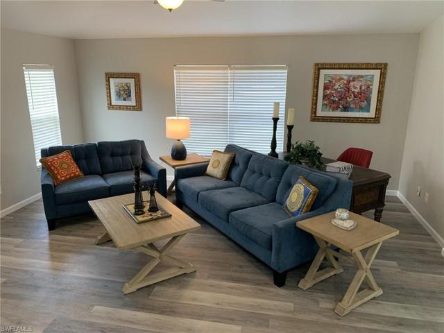 This family room is so large there is room to walk around the furniture and room for an office area too.