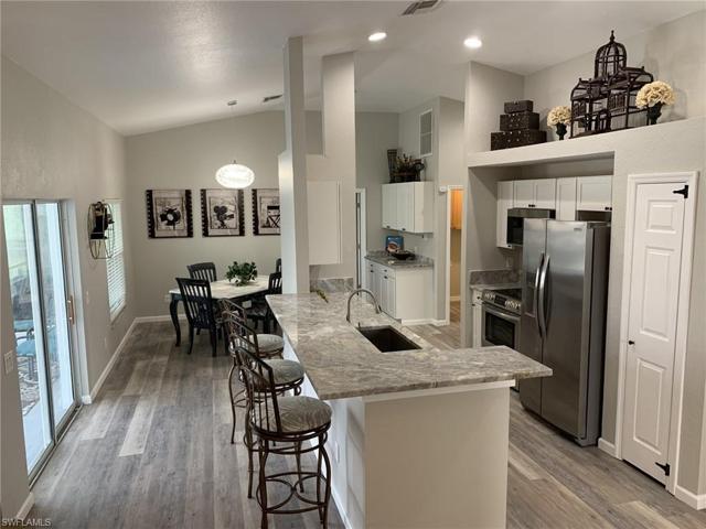 You will love this wide open gourmet kitchen with large breakfast bar island.