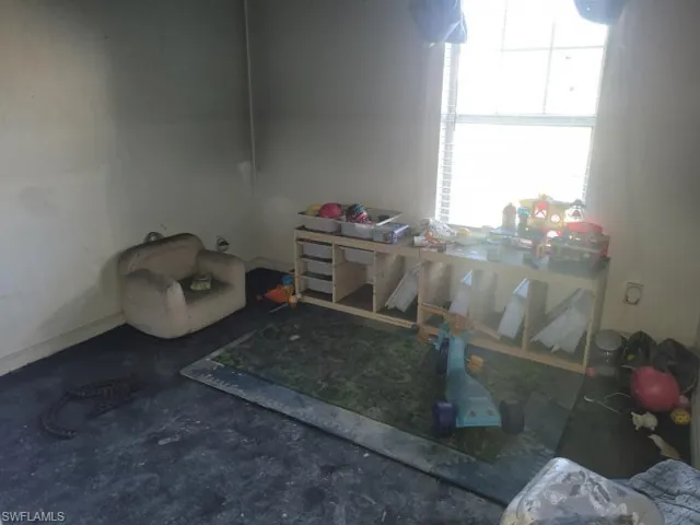 Misc room with concrete floors