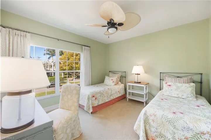 Bedroom featuring carpet flooring and a ceiling fan