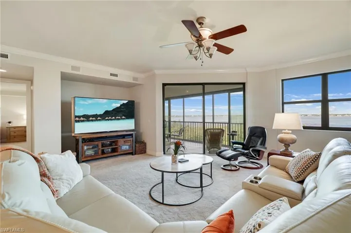 Living Room featuring crown molding, 9' ceilings and spectacular views.