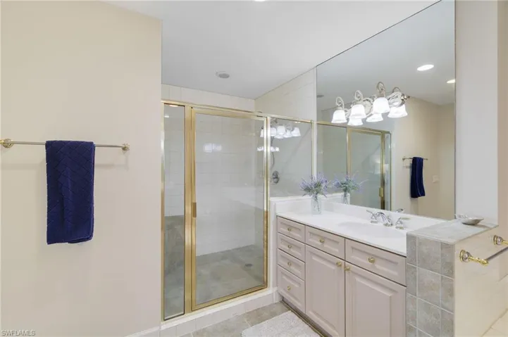 Ensuite Bathroom view of shower with corner bench