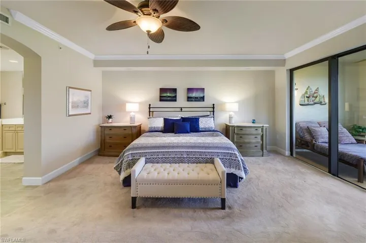 Pictured is king sized bed in Primary Bedroom for dimension reference.