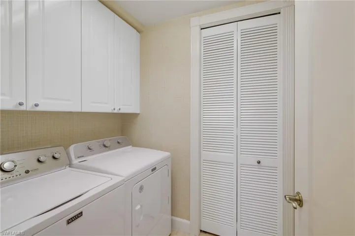 Laundry Room with storage closet