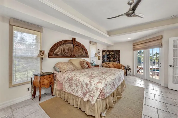 Bedroom featuring access to outside, recessed lighting, and a ceiling fan