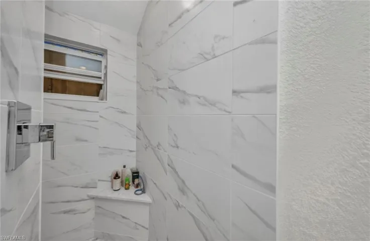 View of second bathroom shower