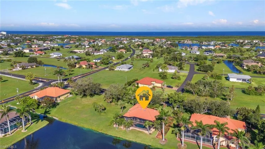Aerial view of residential area with a nearby body of water