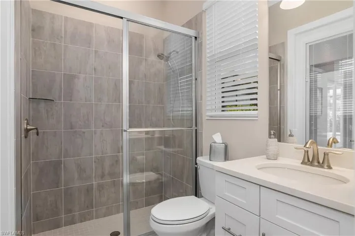 Guest ensuite bath and pool bath.
