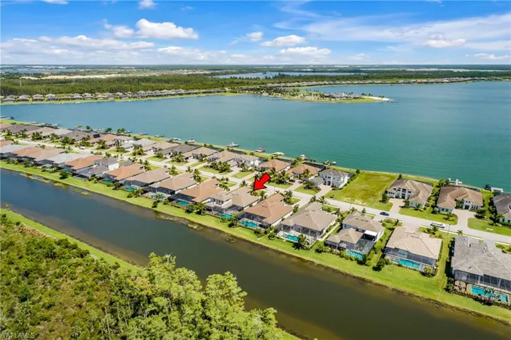 Perfectly located in the community--halfway between the guarded gate and the amenity center--this home features a gorgeous Southwestern Exposure and water/preserve views featuring SUNSETS and WILDLIFE at every turn!