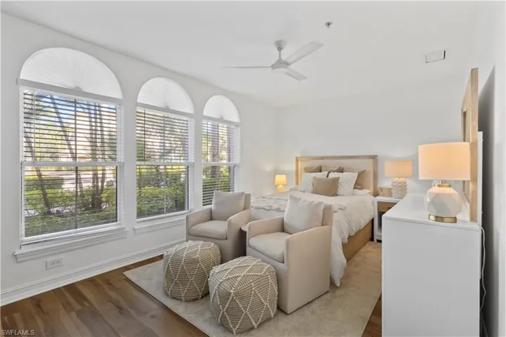 Bedroom featuring wood finished floors and ceiling fan