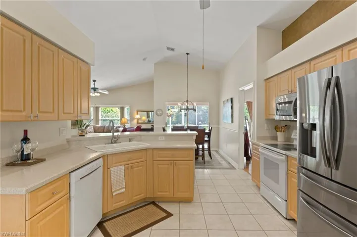 Open Floor Plan, Kitchen with views to Lani and Preserve. Stainless Appliances