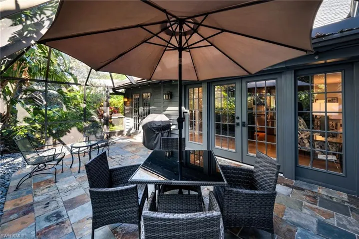 View of patio with area for grilling and french doors