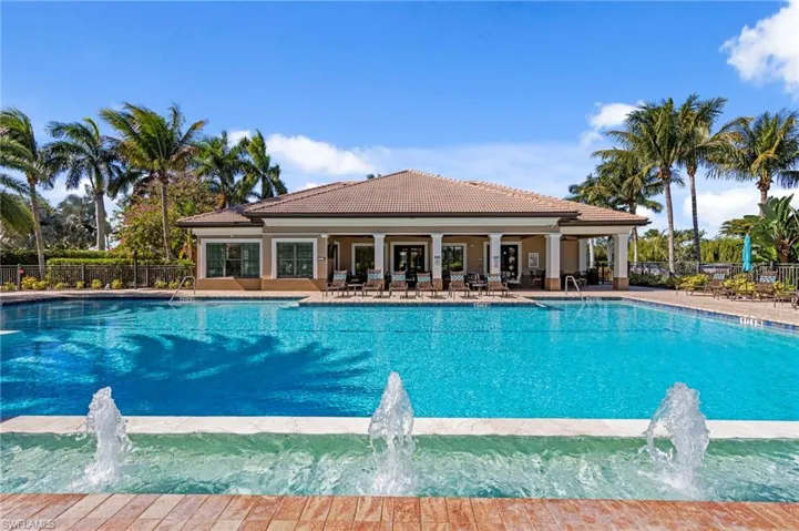 Community pool featuring a patio area
