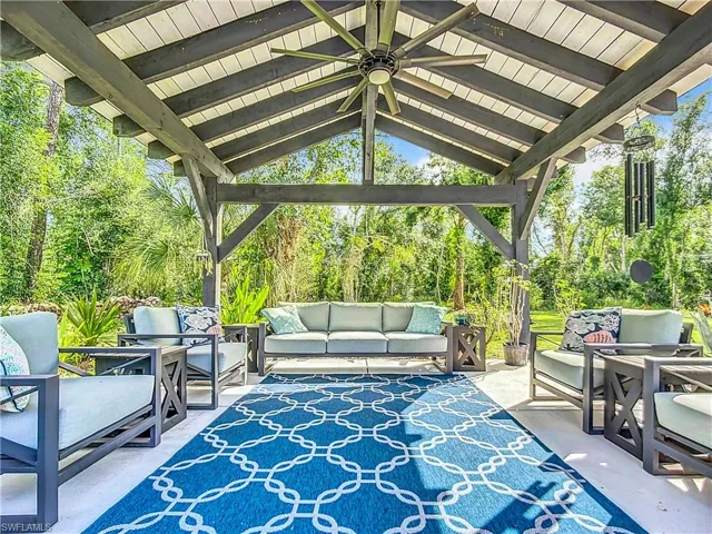 Pavillion/patio area with eectric and a designer fan for quiet time outside living