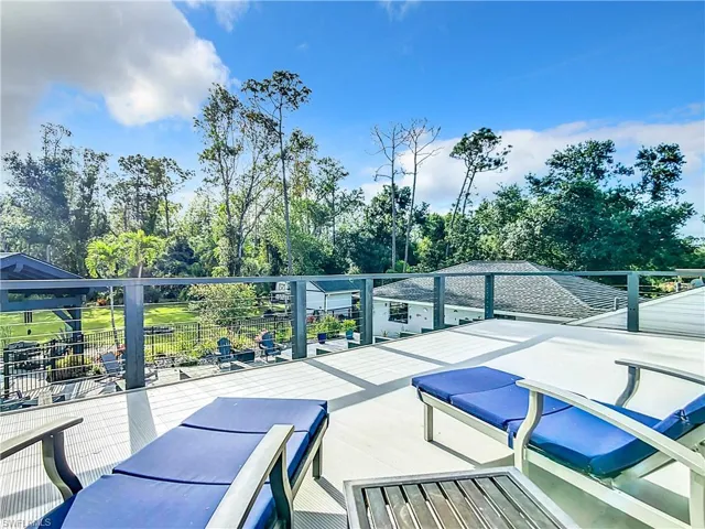 Balcony View of patio /pool/backyard from the primary suite
