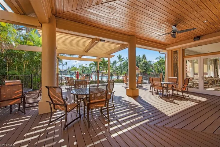 CLUBHOUSE DECK LEADING TO THE COMMUNITY POOL