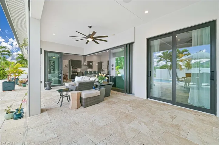 View of patio / terrace featuring ceiling fan and an outdoor hangout area